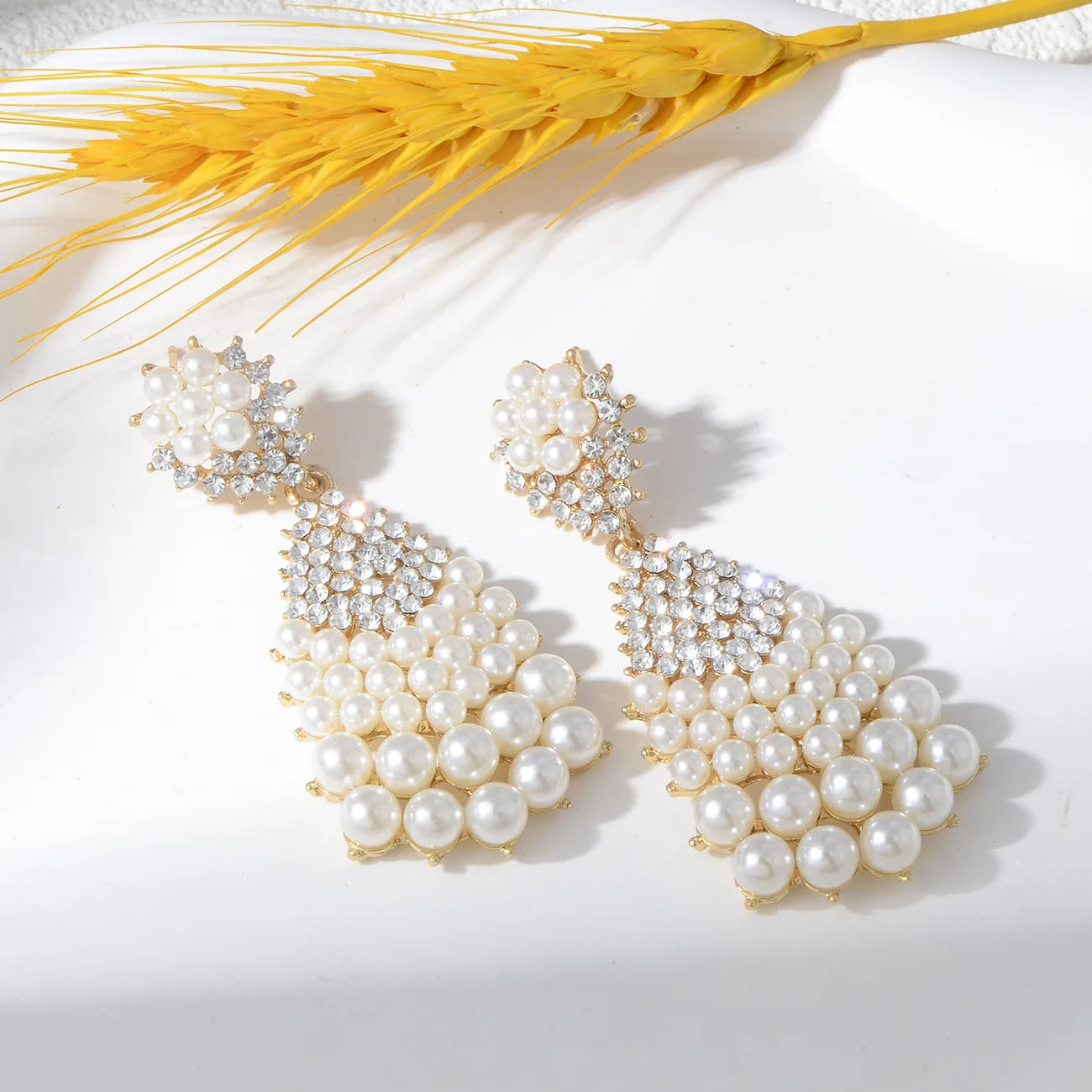 Luxurious pearl earrings full of zircons large water drops