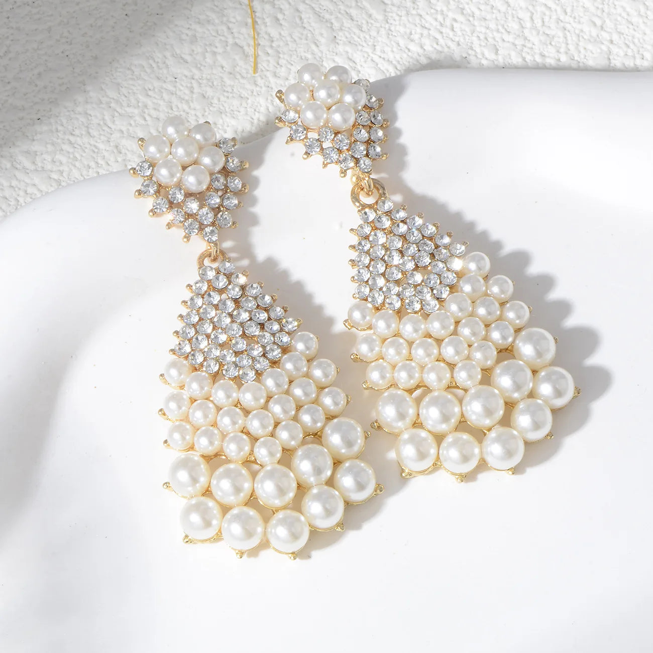 Luxurious pearl earrings full of zircons large water drops