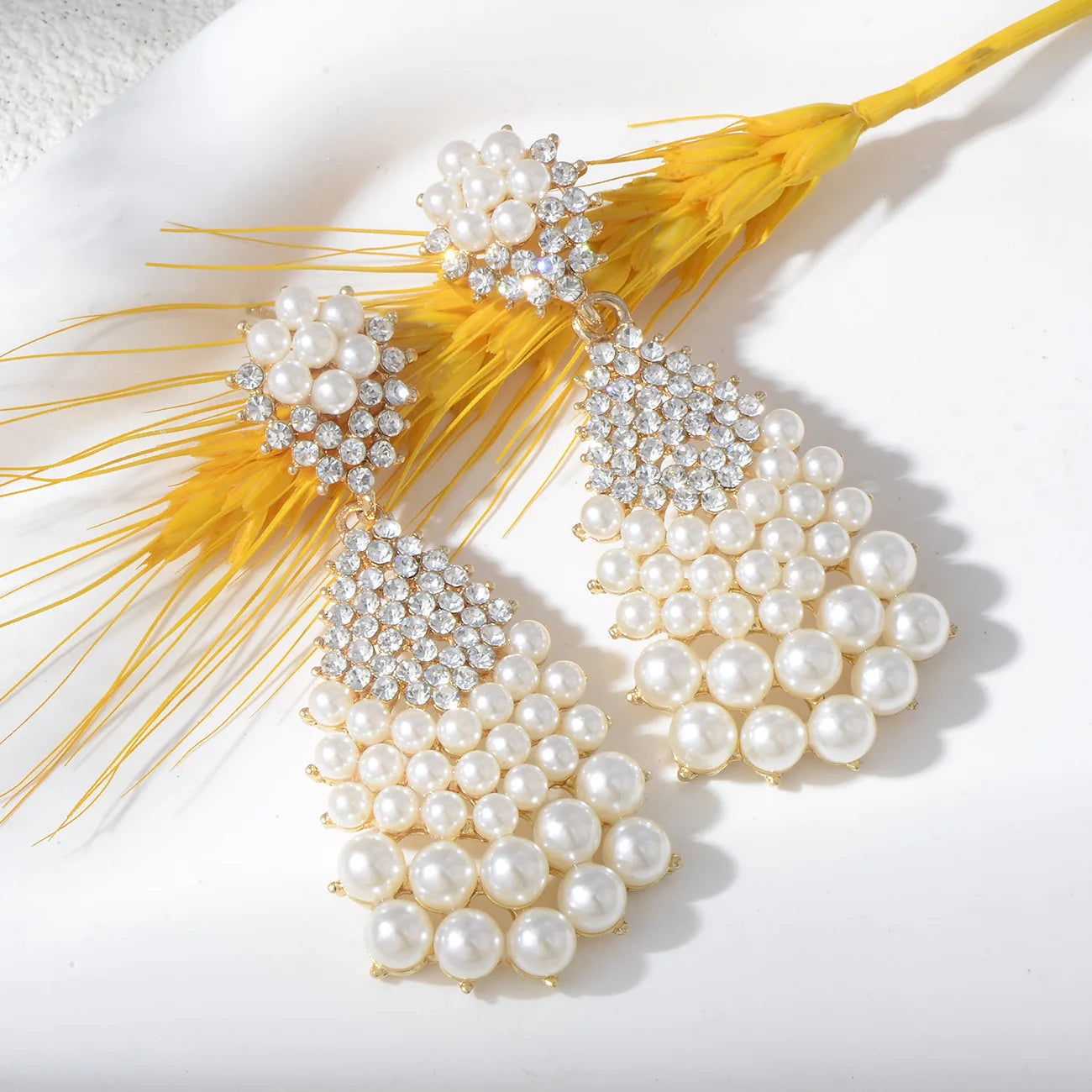 Luxurious pearl earrings full of zircons large water drops